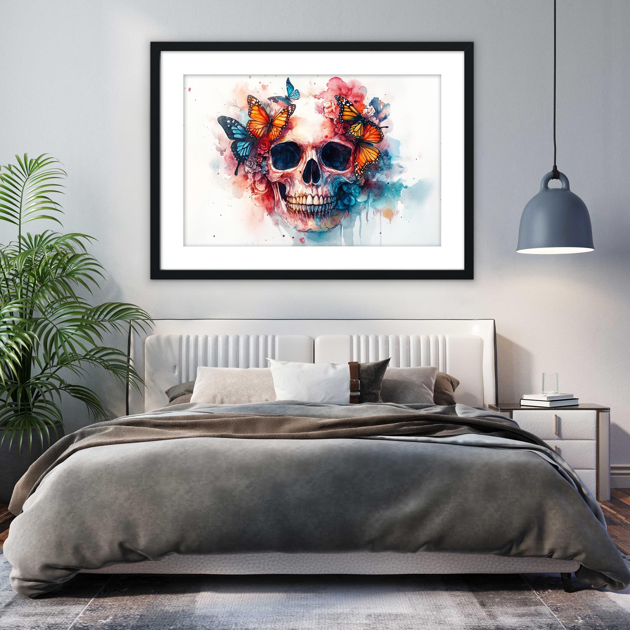 a bedroom with a large bed, a framed artwork of a colorful skull with butterflies hanging above it, and a potted plant to the left.