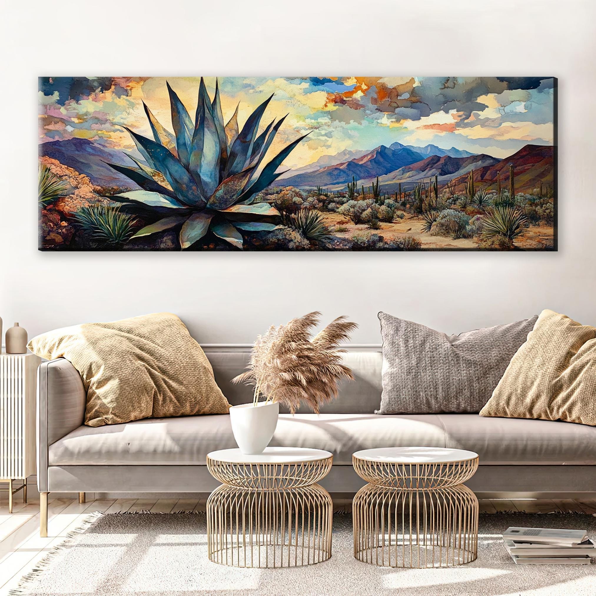 a living room with a couch and a painting on the wall