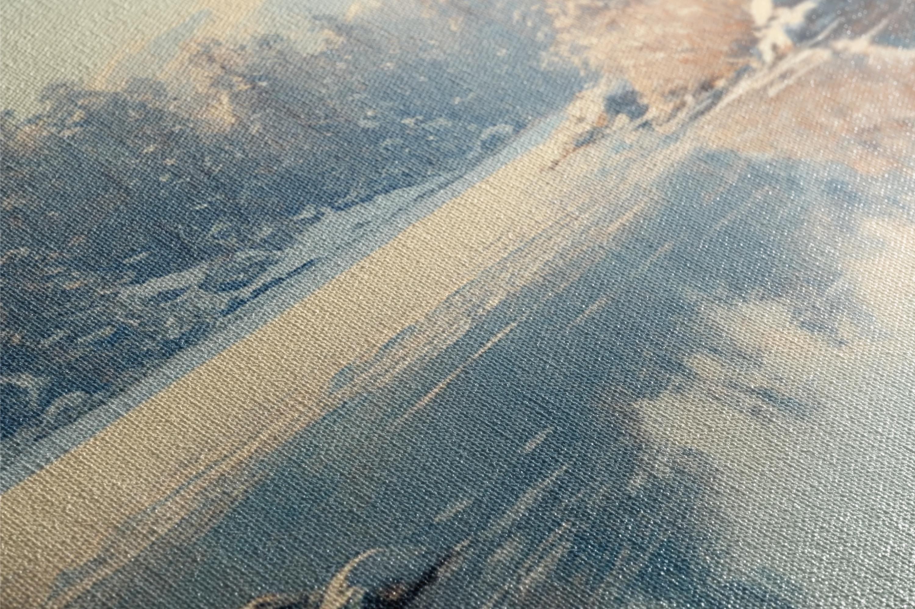 an aerial view of a plane flying over a mountain range