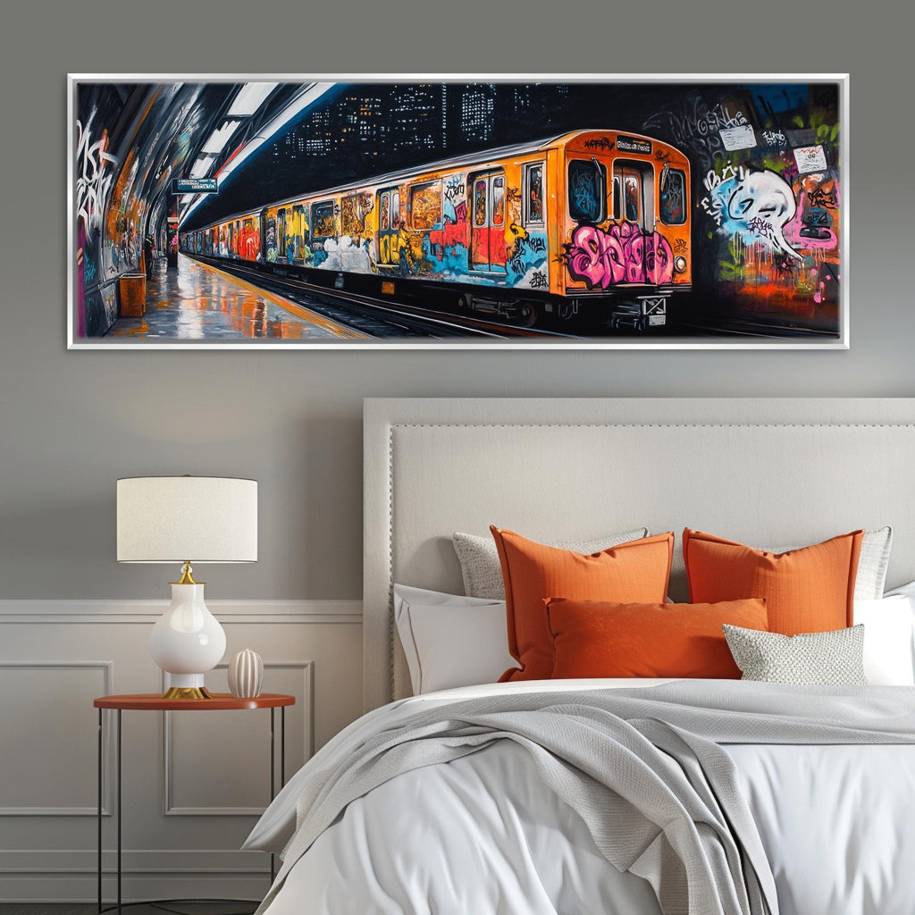 a bedroom with a bed and a painting on the wall