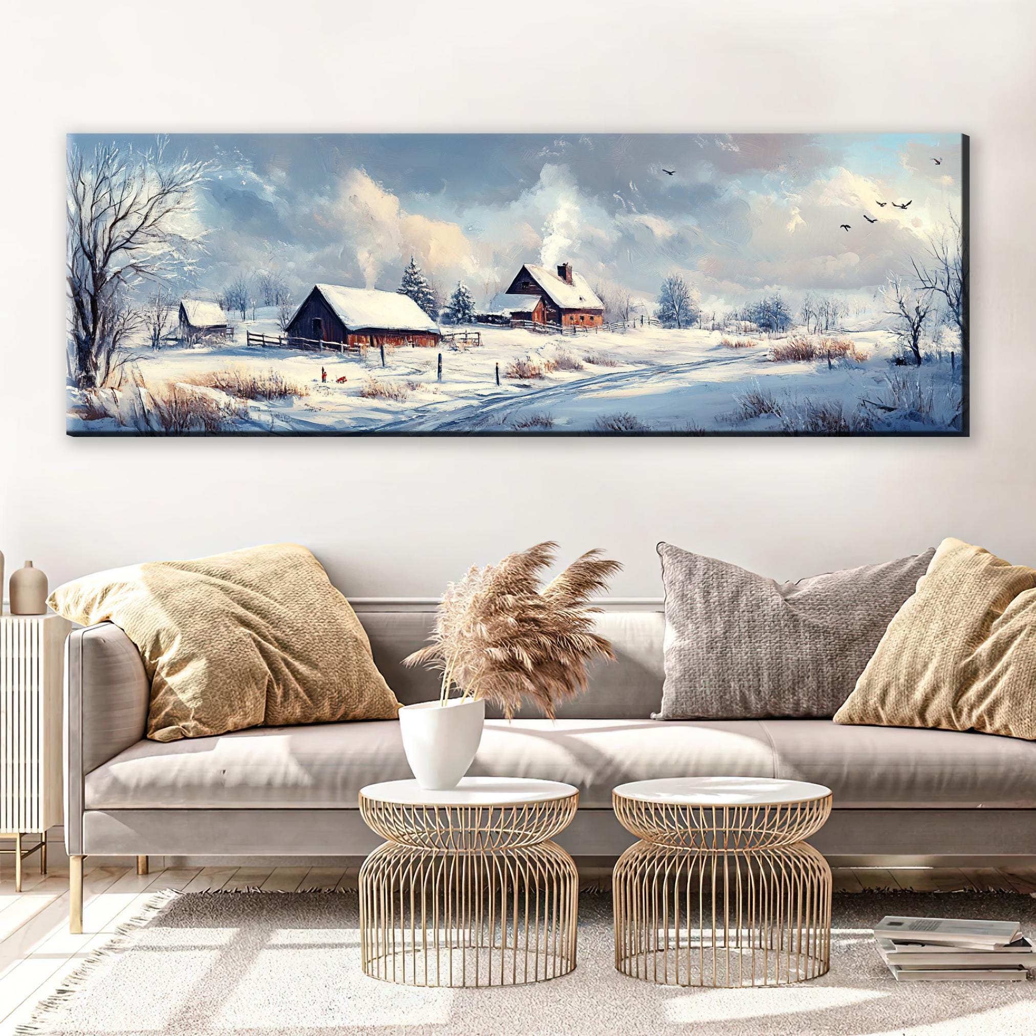 a living room with a couch and a painting on the wall