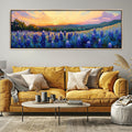 a living room with a couch and a painting on the wall