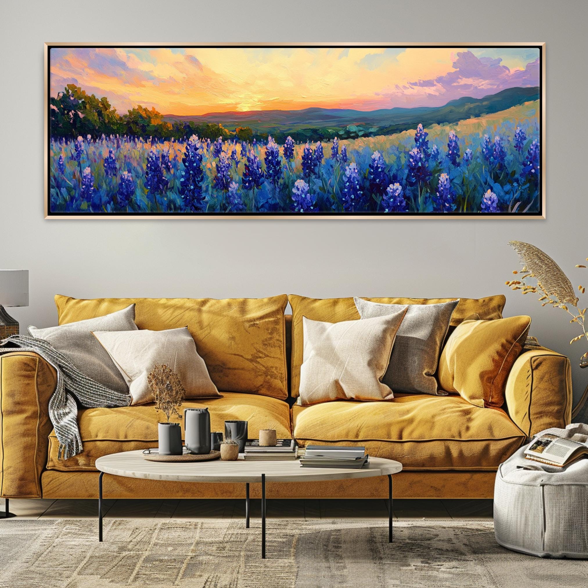 a living room with a couch and a painting on the wall