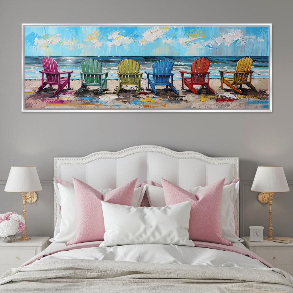 a bed with a white headboard and a painting on the wall above it