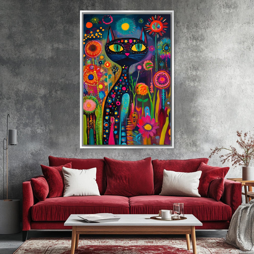 a living room with a red couch and a painting on the wall