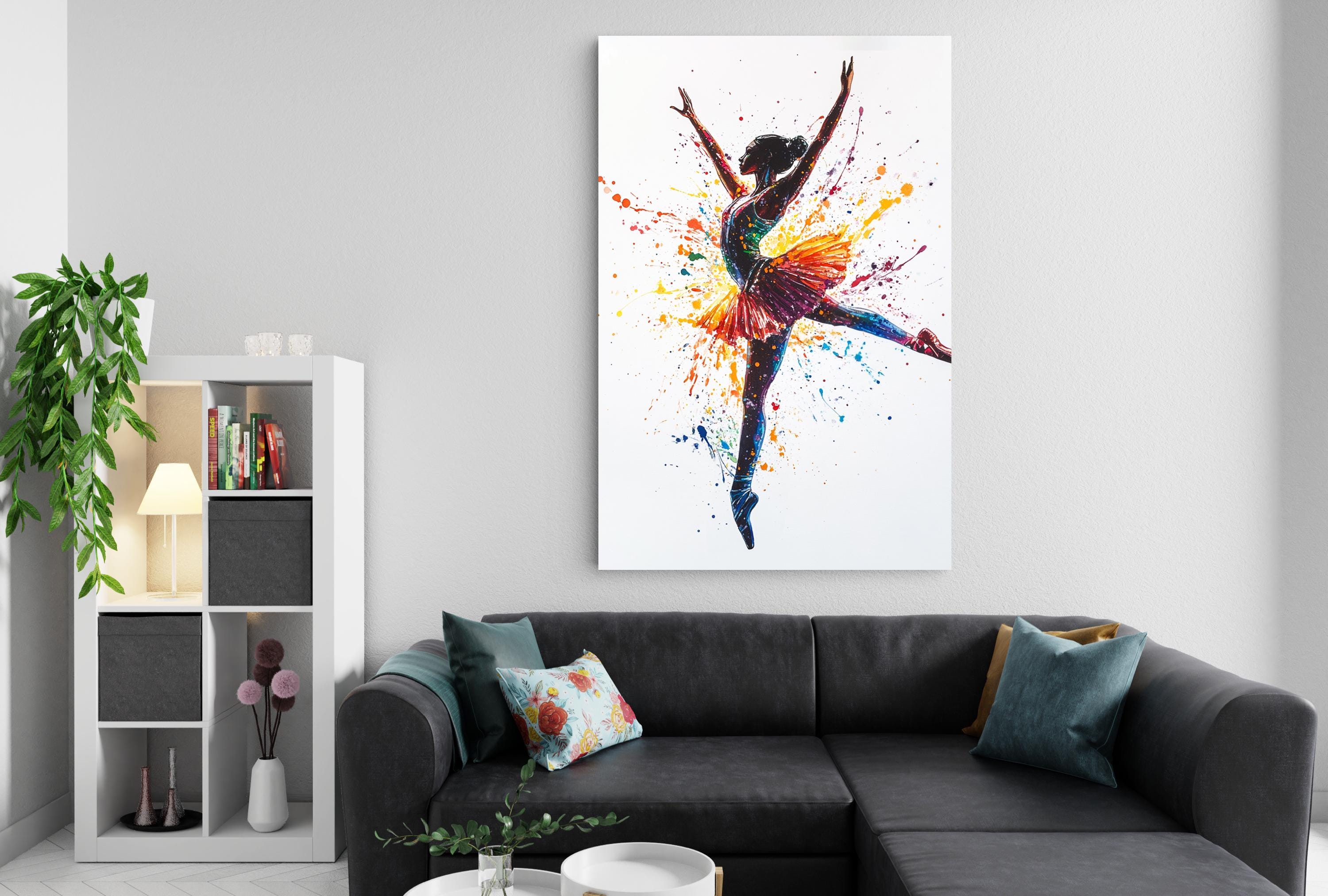 a large, colorful painting of a ballerina in mid-dance, with splashes of color surrounding her, hanging on a white wall above a black couch with throw pillows.