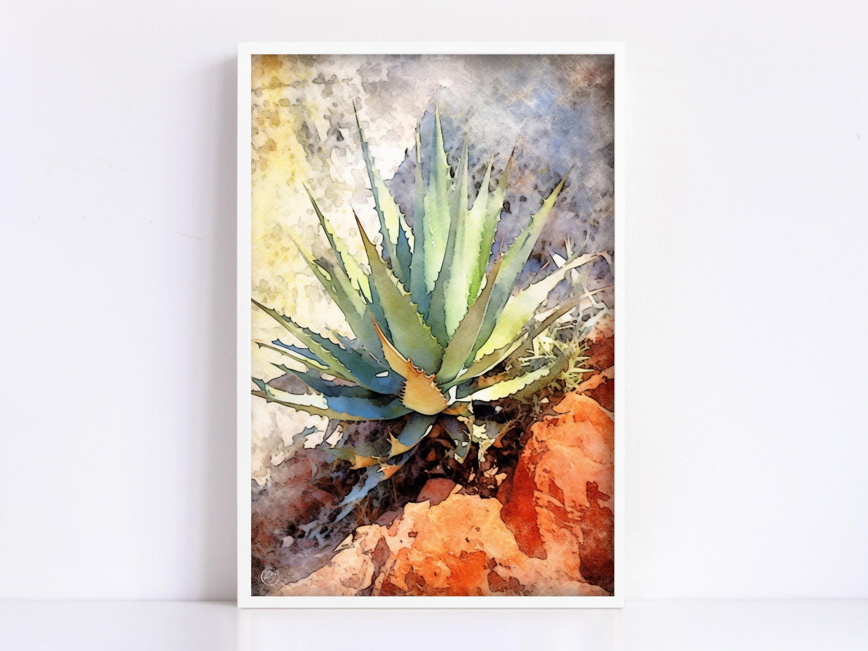 The image is a framed painting depicting a vibrant cactus plant with long, thin leaves and a distinctive shape, set against a rocky background.