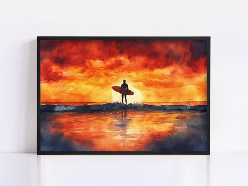A surfer stands on the beach, silhouetted against a vibrant sunset sky with orange and red hues.