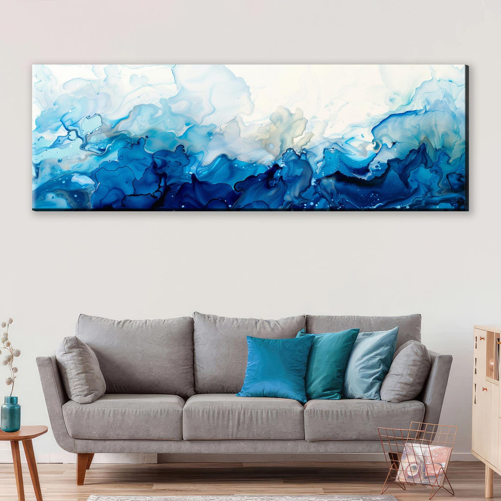 a living room with a couch and a painting on the wall