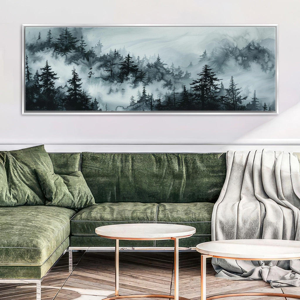 a living room with a green couch and a painting on the wall