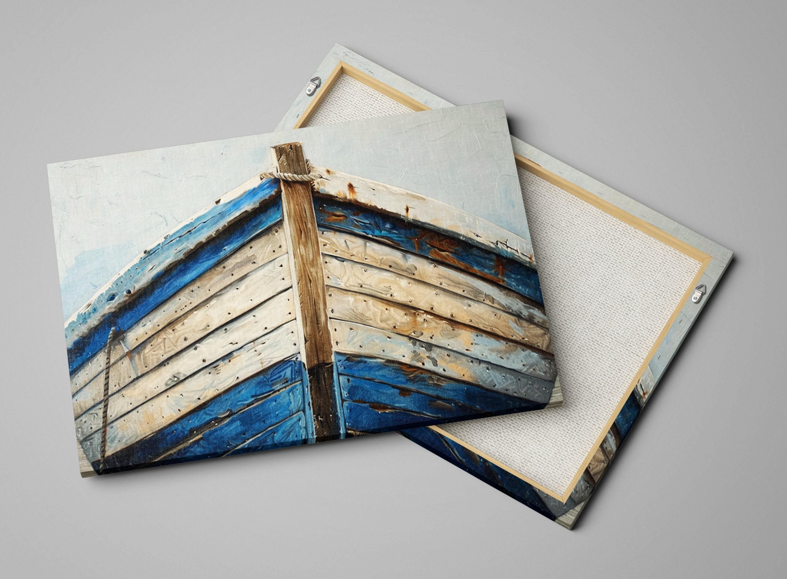 a wooden boat with blue and white colors, resting on a white surface.