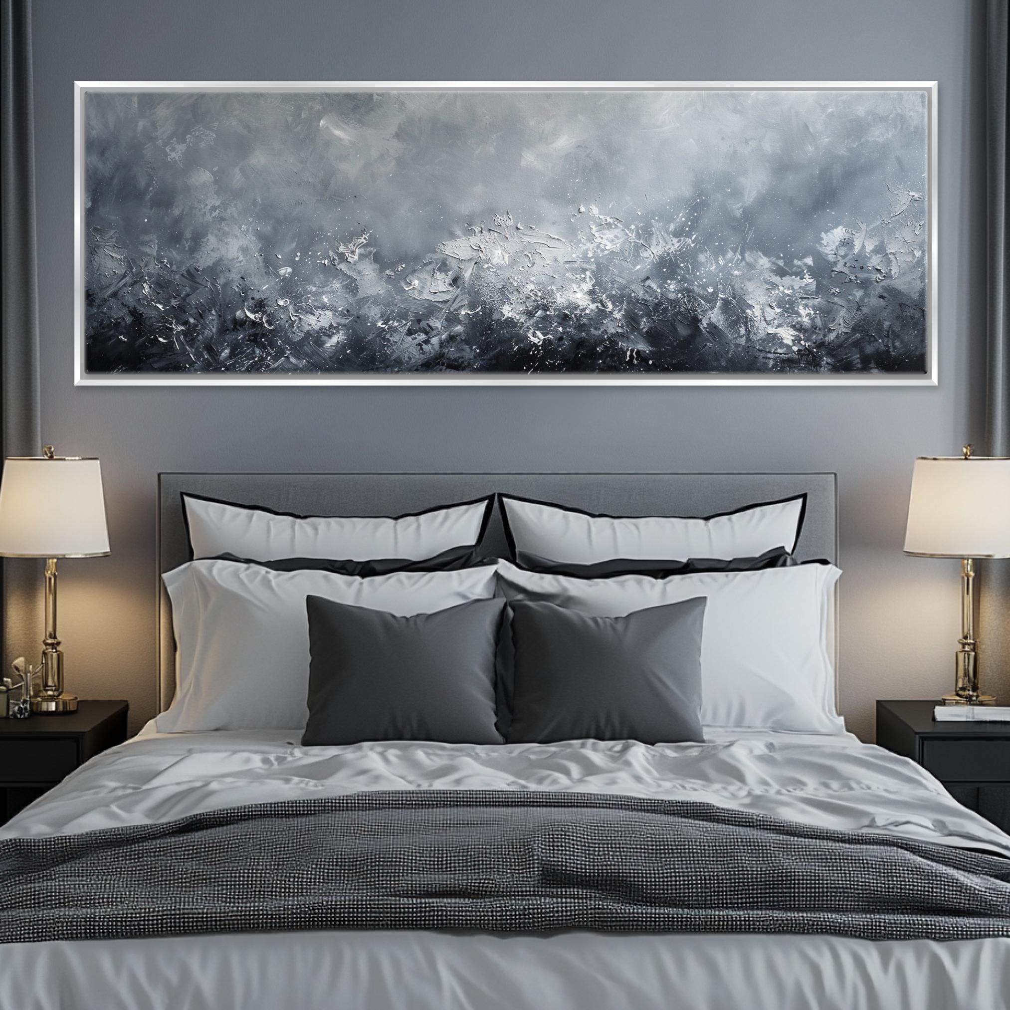 a bedroom with a large painting above the bed