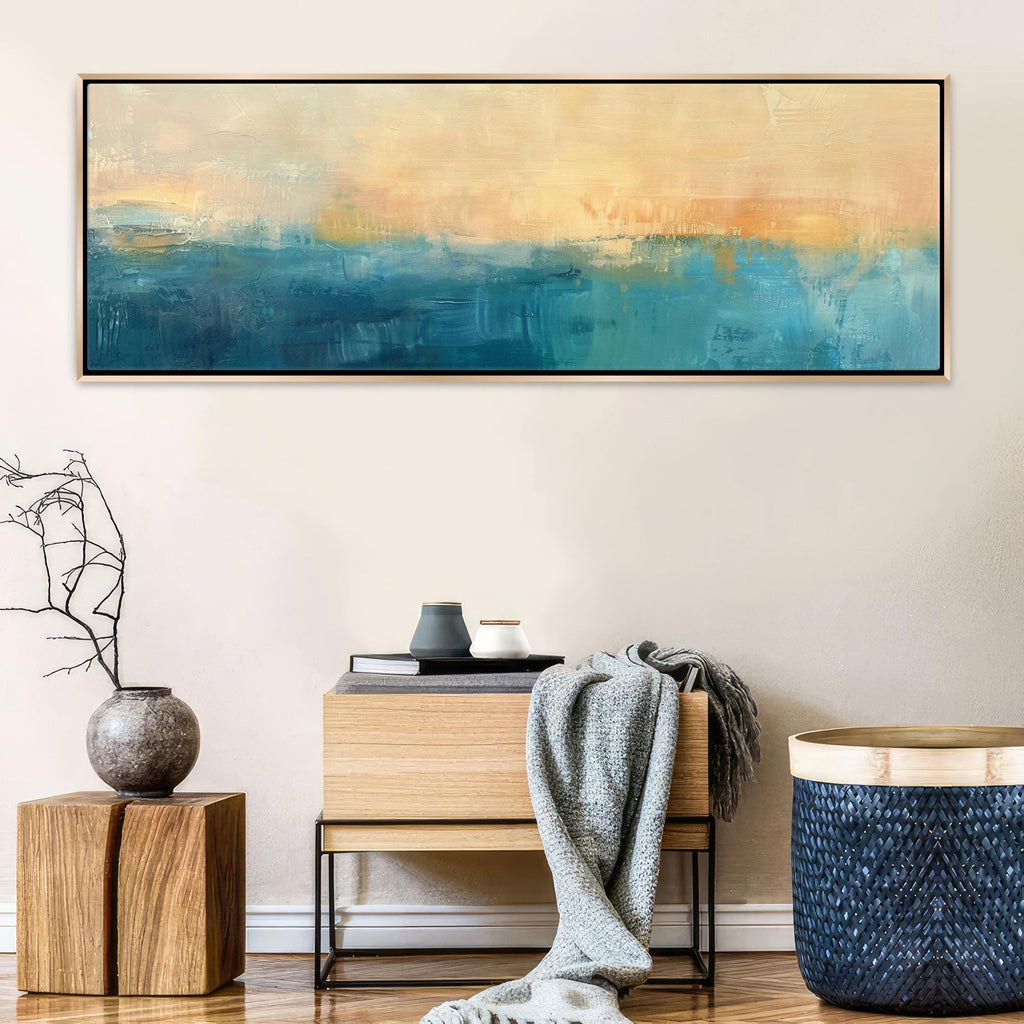 a painting hanging on a wall above a table