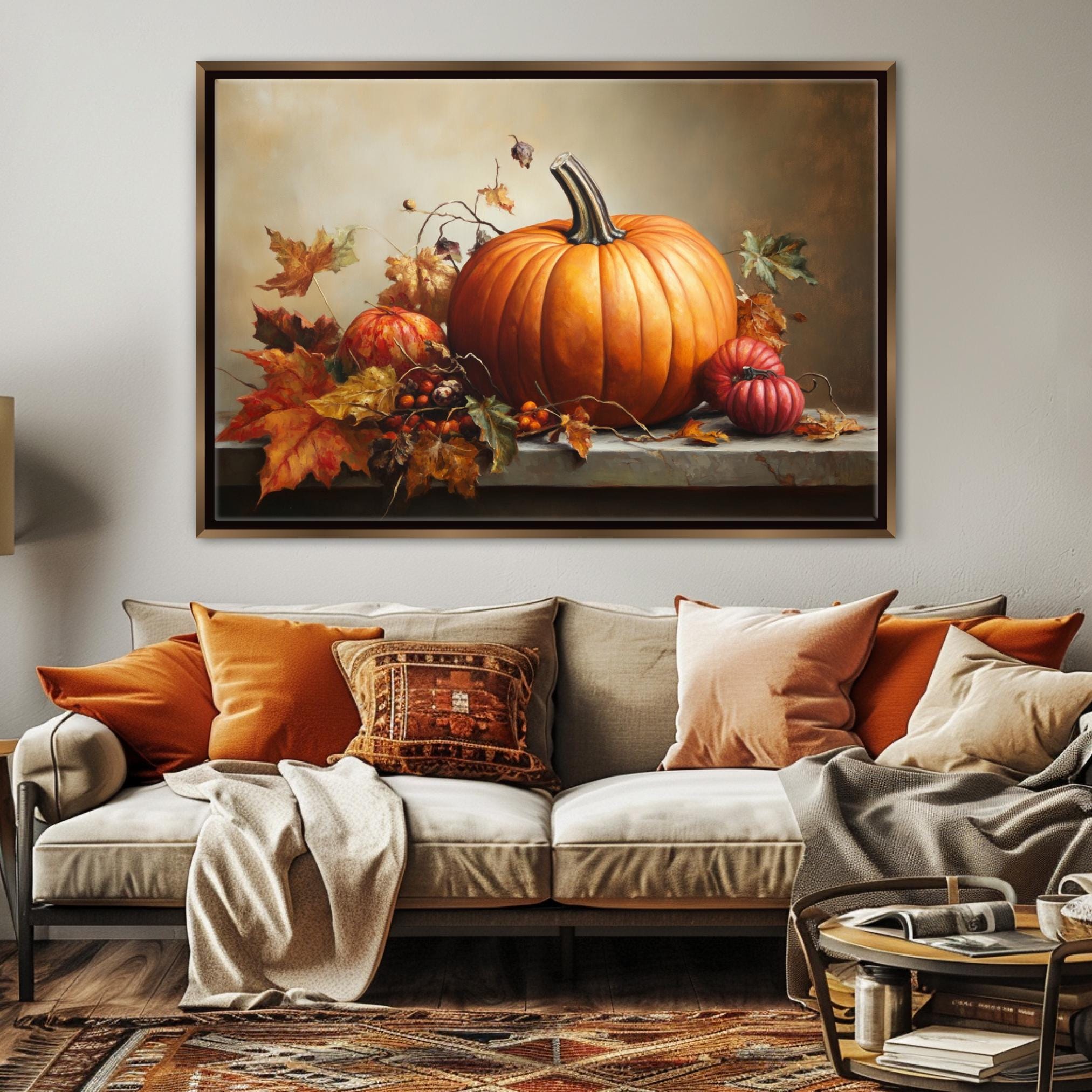 a large painting of pumpkins and autumn leaves hanging on a wall above a couch in a living room setting.