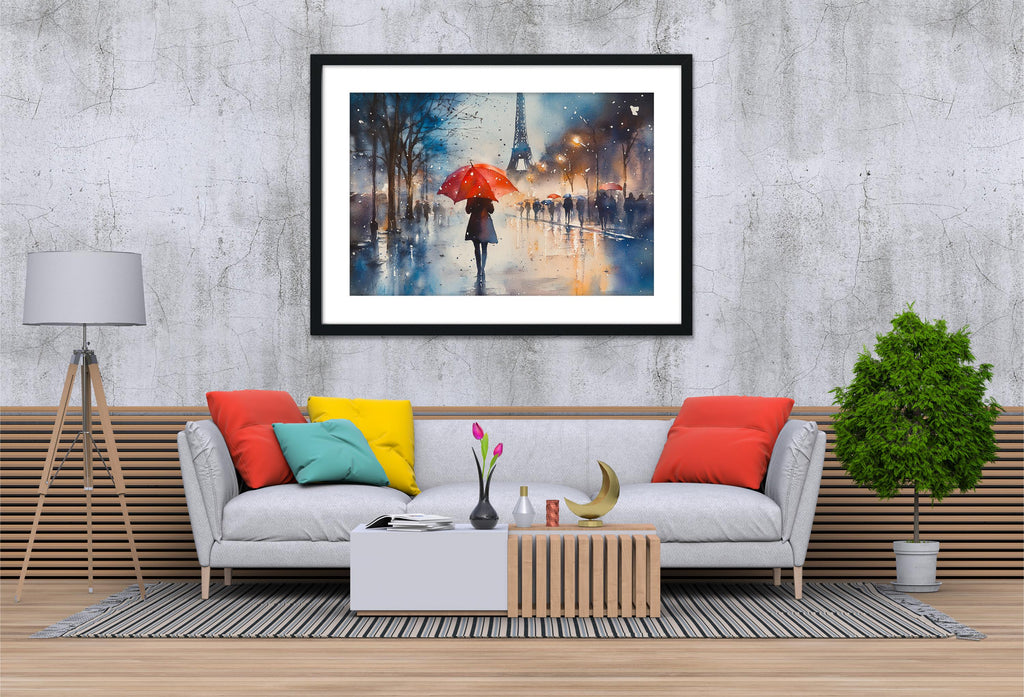a cozy living room with a gray sofa adorned with colorful pillows, a coffee table with a vase of flowers, and a framed painting of a rainy street scene hanging on the wall.