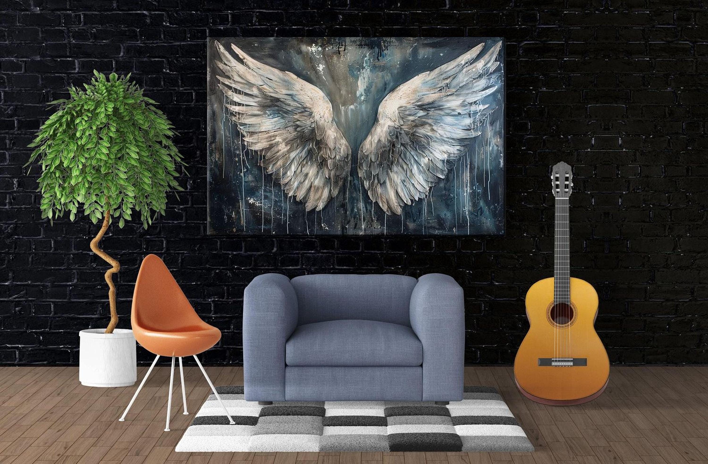 a modern living room with a large painting of a pair of angel wings hanging on the wall. The room is furnished with a blue armchair, an orange chair, and a guitar, creating a cozy and stylish atmosphere.