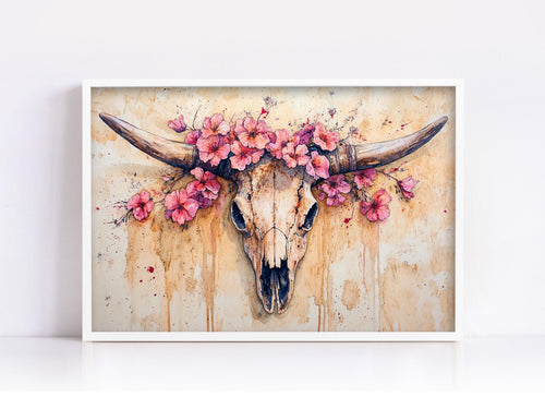 A framed painting depicting a skull with large horns adorned with pink flowers.