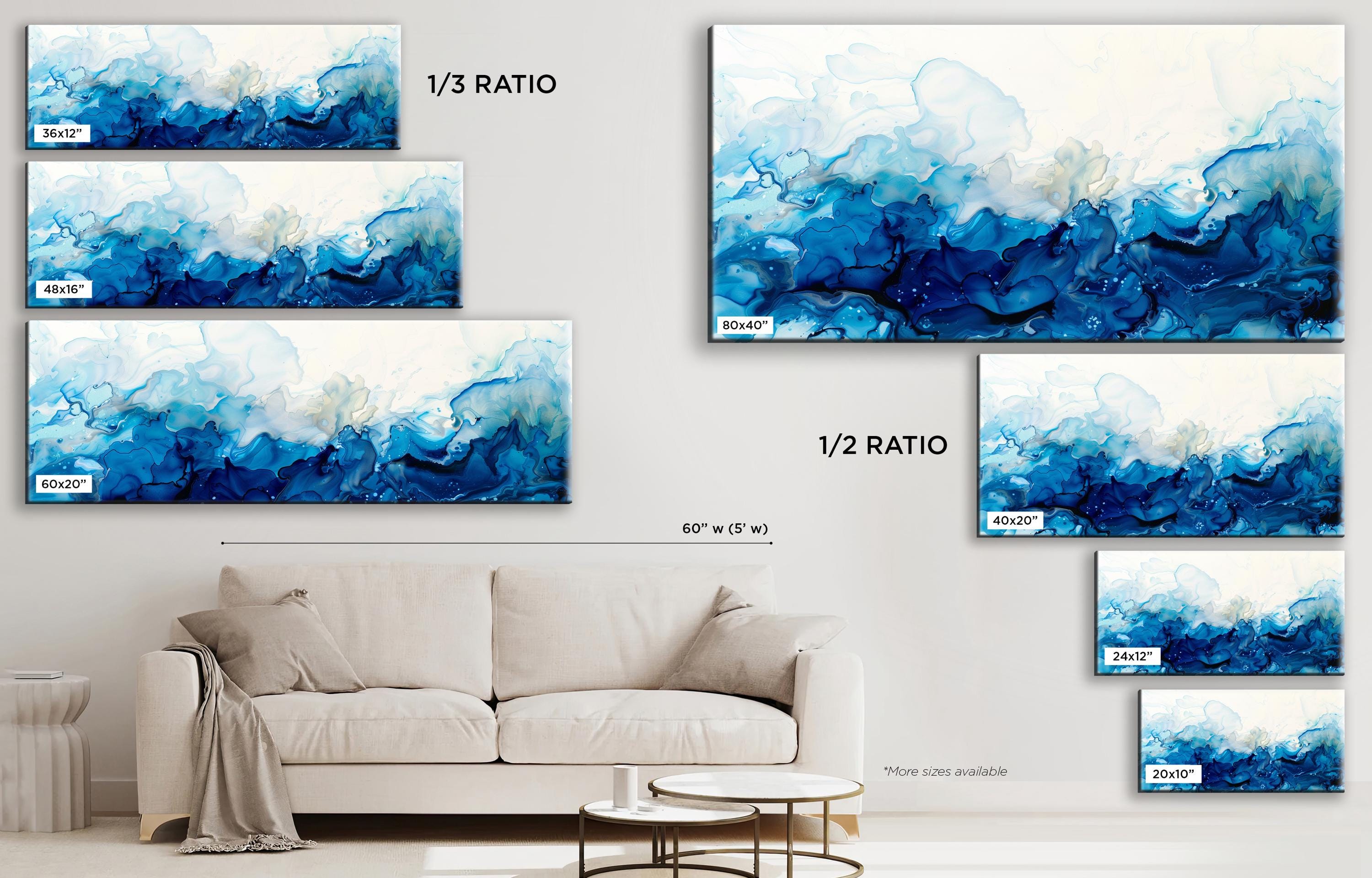 a living room with a couch and paintings on the wall