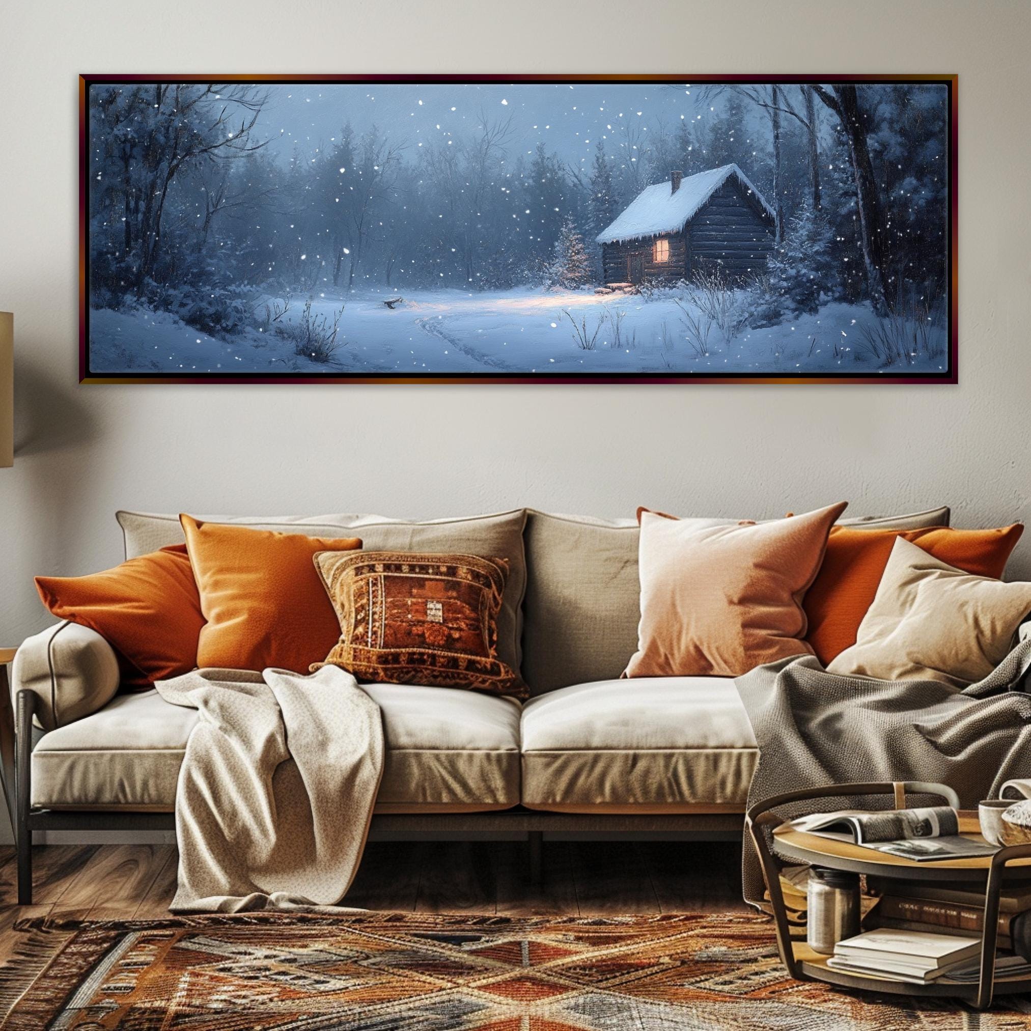 a living room with a couch and a painting on the wall