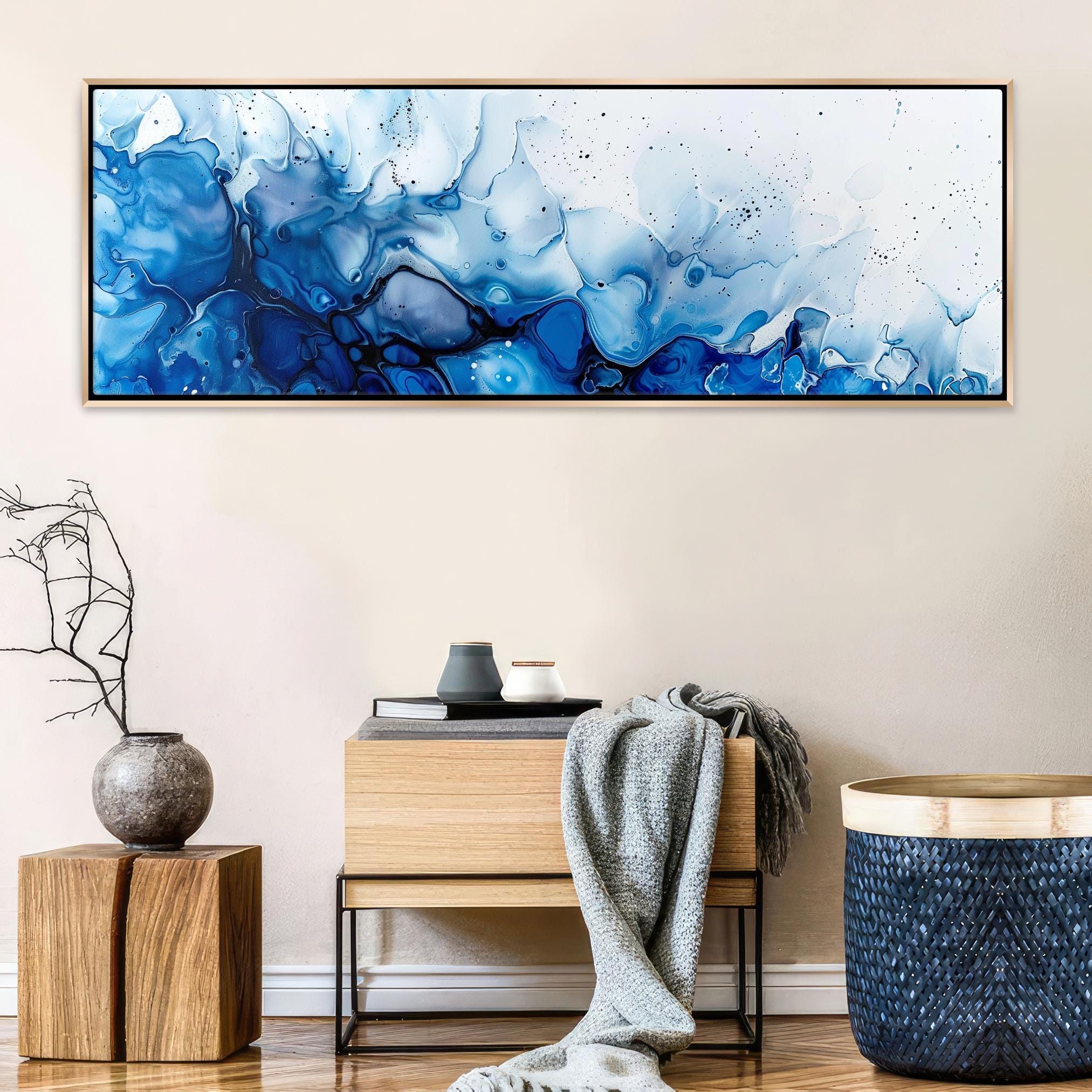 a painting hanging on a wall in a living room
