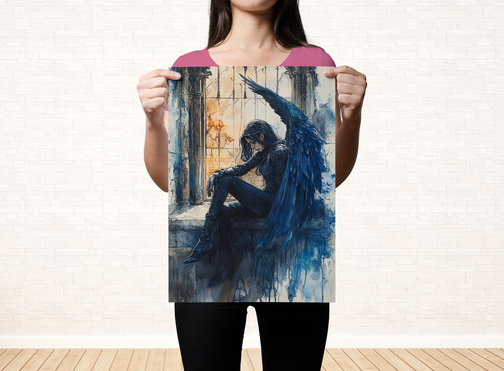 A woman is holding up a framed artwork depicting a dark, winged figure with a serious expression.