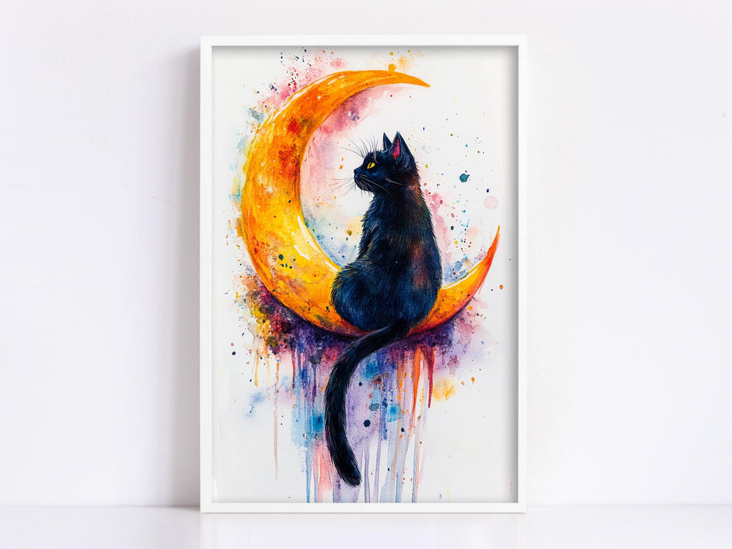 A framed painting depicting a black cat sitting on a crescent moon, with splashes of color surrounding the cat and moon.