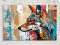 The image is a vibrant, colorful painting of a fox's head, featuring bold brushstrokes and splatters of paint in various colors such as red, orange, yellow, and blue.