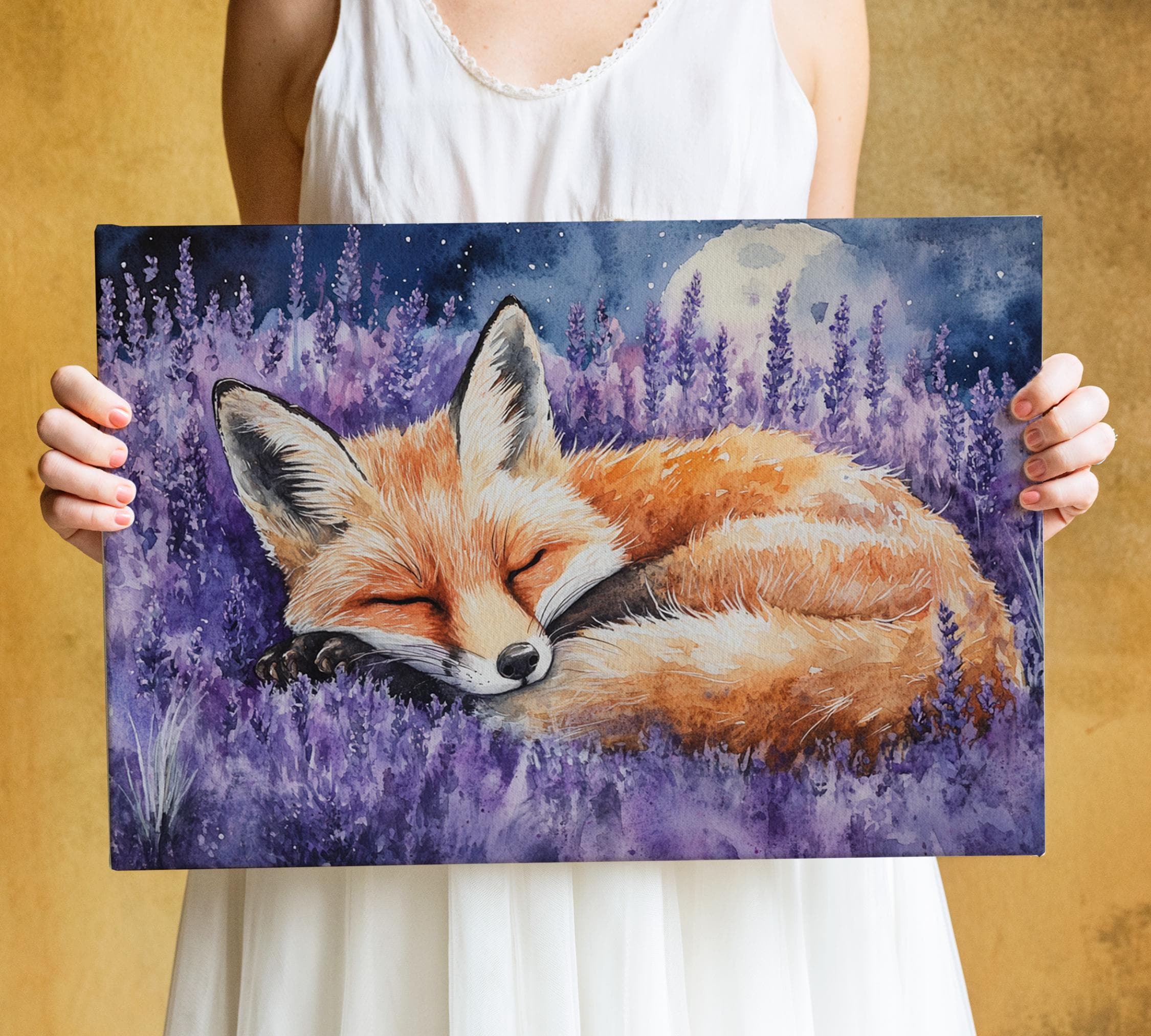 A person is holding a framed painting of a sleeping fox in a field of purple flowers, with a full moon in the background.